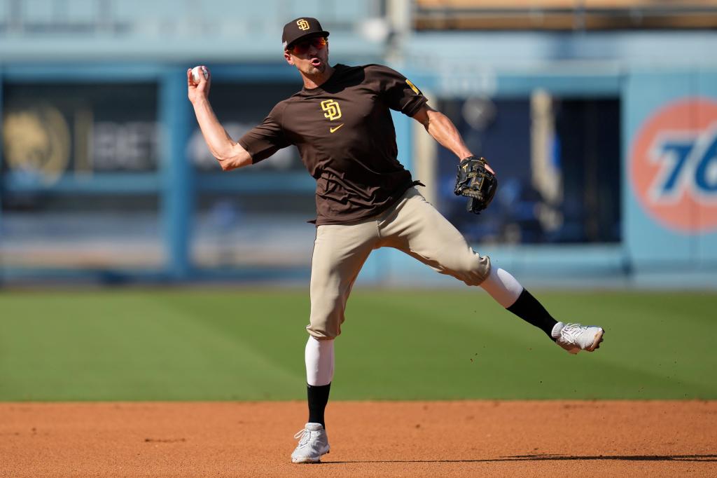 San Diego Padres shortstop Nick Ahmed works out during practice in preparation for Game 1 of a baseball NL Division Series against the Los Angeles Dodgers in Los Angeles, Friday, Oct. 4, 2024. 