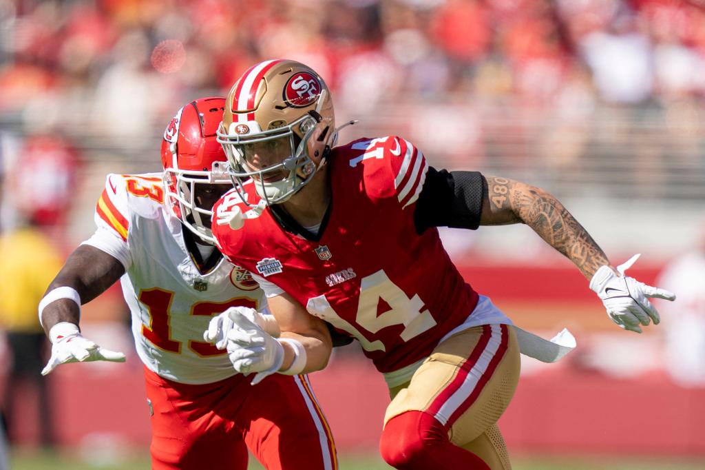 49ers wide receiver Ricky Pearsall (14) runs against Kansas City Chiefs safety Nazeeh Johnson