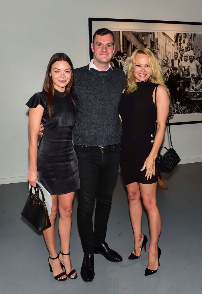 Cooper Hefner is seen above with Scarlett Byrne and Pamela Anderson in 2019.