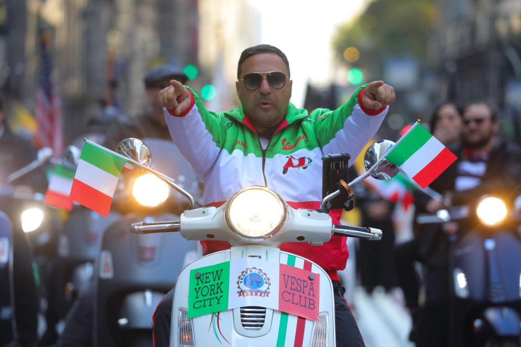 An Italian-themed vespa scooter featured in the Columbus Day Parade.