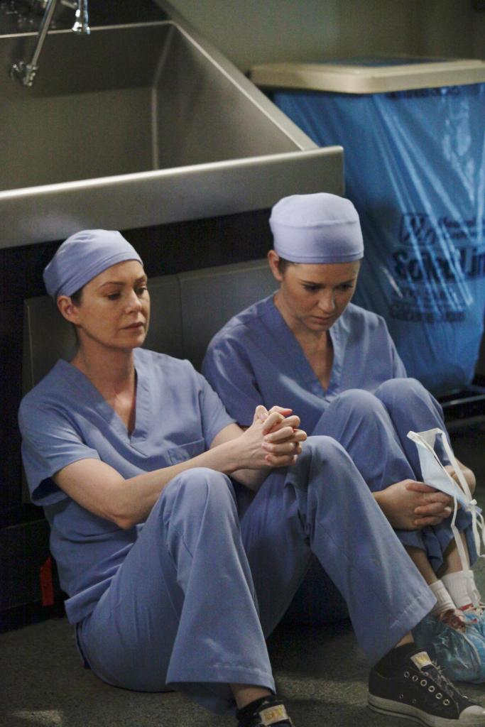 Ellen Pompeo and Sarah Drew on "Grey's Anatomy" looking worried. 