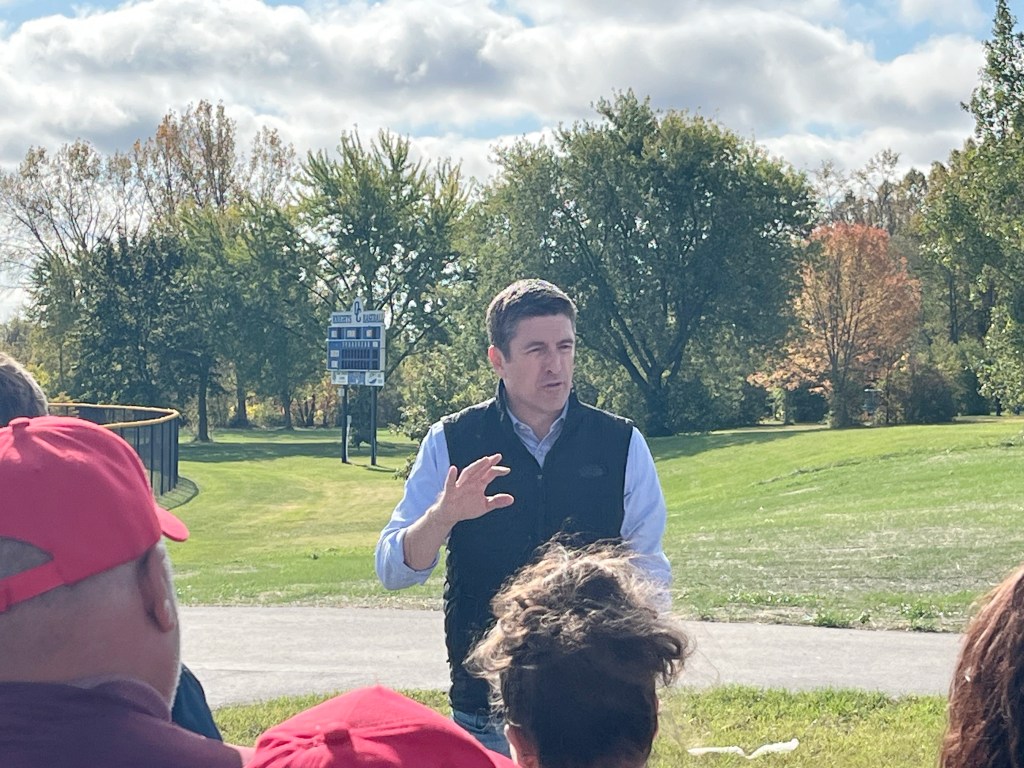 Rep. Bryan Steil addressing Young Republicans volunteers in a park before door knocking deployment in Oak Creek, Wisconsin.