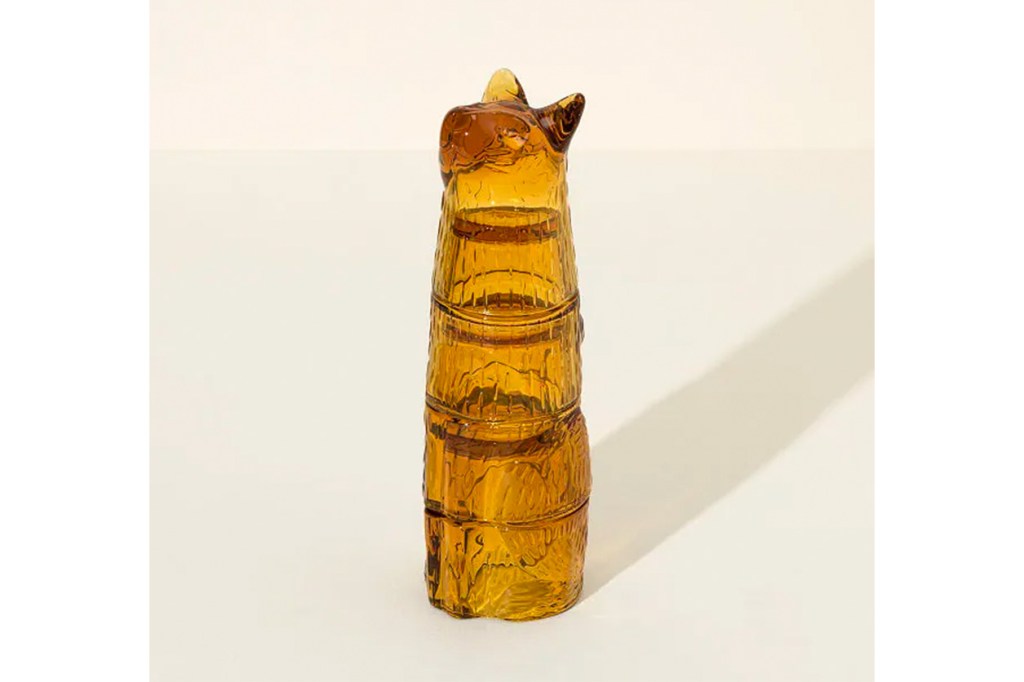 A glass object shaped like a cat