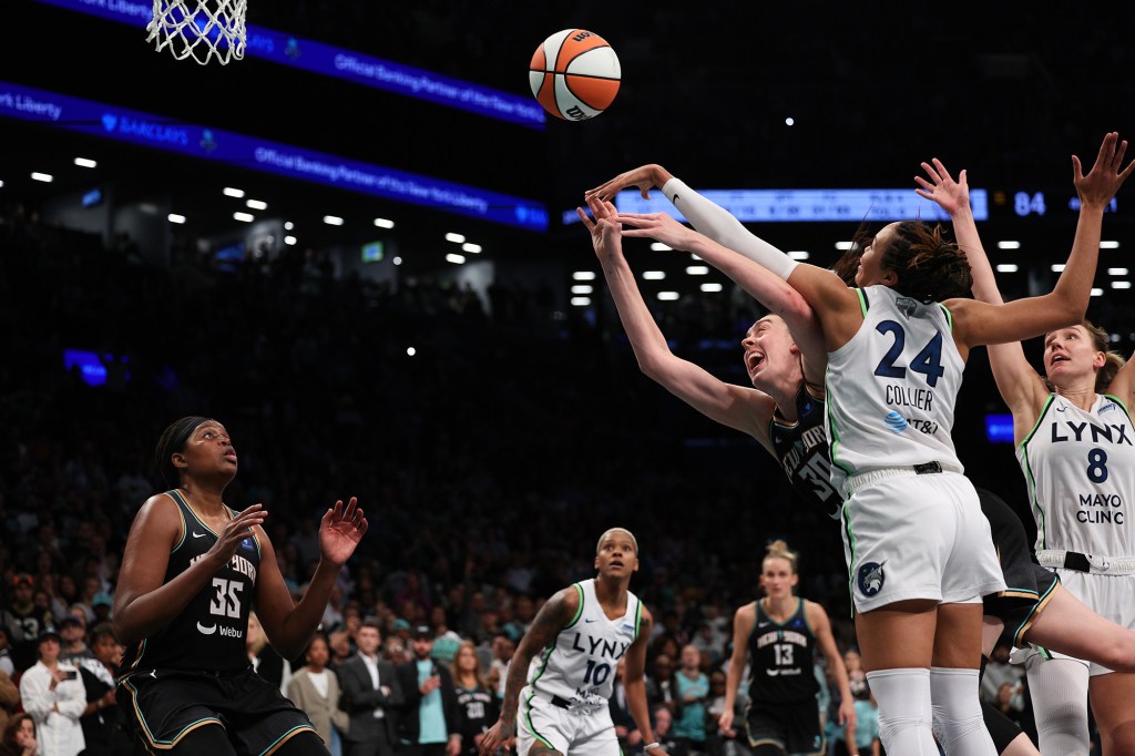 Breanna Stewart gets fouled by Napheesa Collier during the fourth quarter on Oct. 10.