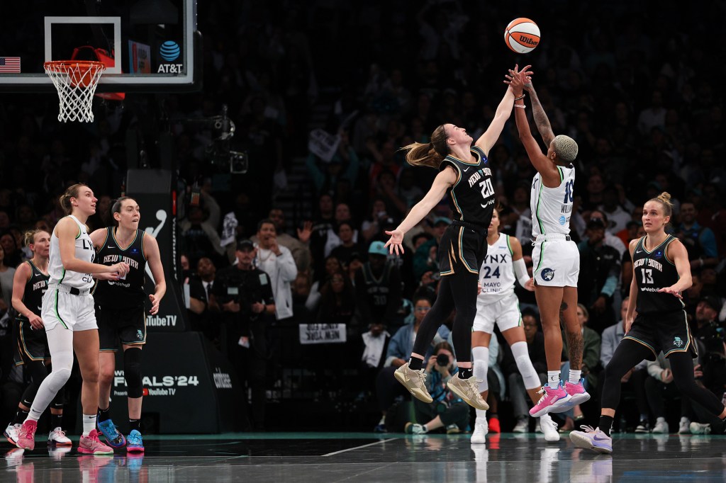 Courtney Williams gets fouled by Sabrina Ionescu during the fourth quarter on Oct. 10.