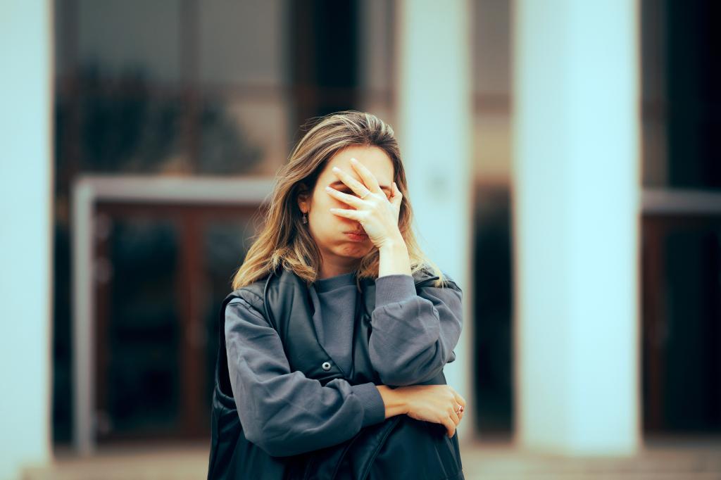 woman looking stressed.