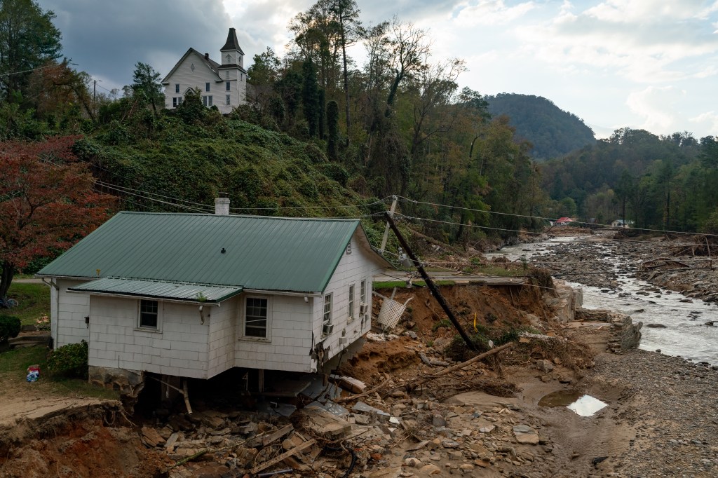 A homes foundation washed away in Bat Cave, North Carolina