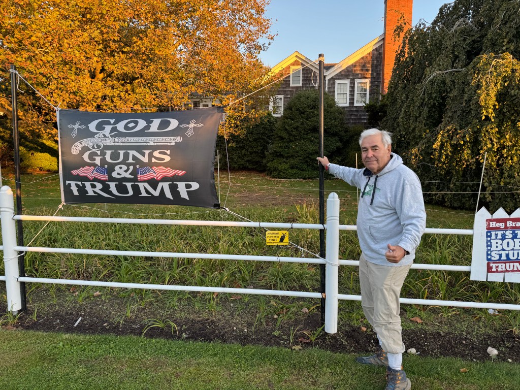 Andy Sabin of Amagansett with his Donald Trump lawn signs