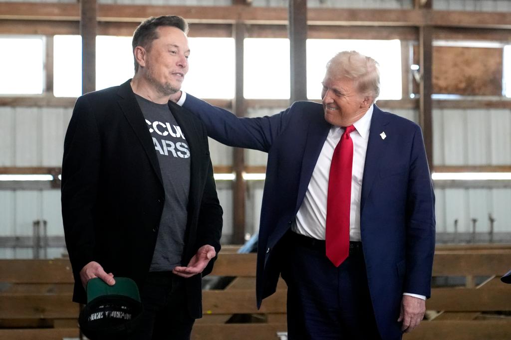 Elon Musk and Donald Trump in suits at a 2024 campaign event in Butler, Pa