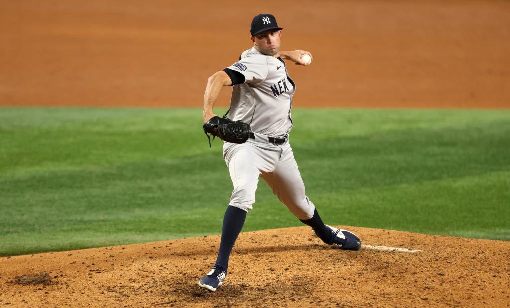 Tim Mayza #58 of the New York Yankees pitches against the Texas Rangers during the sixth inning at Globe Life Field on September 4, 2024 in Arlington, Texas. 