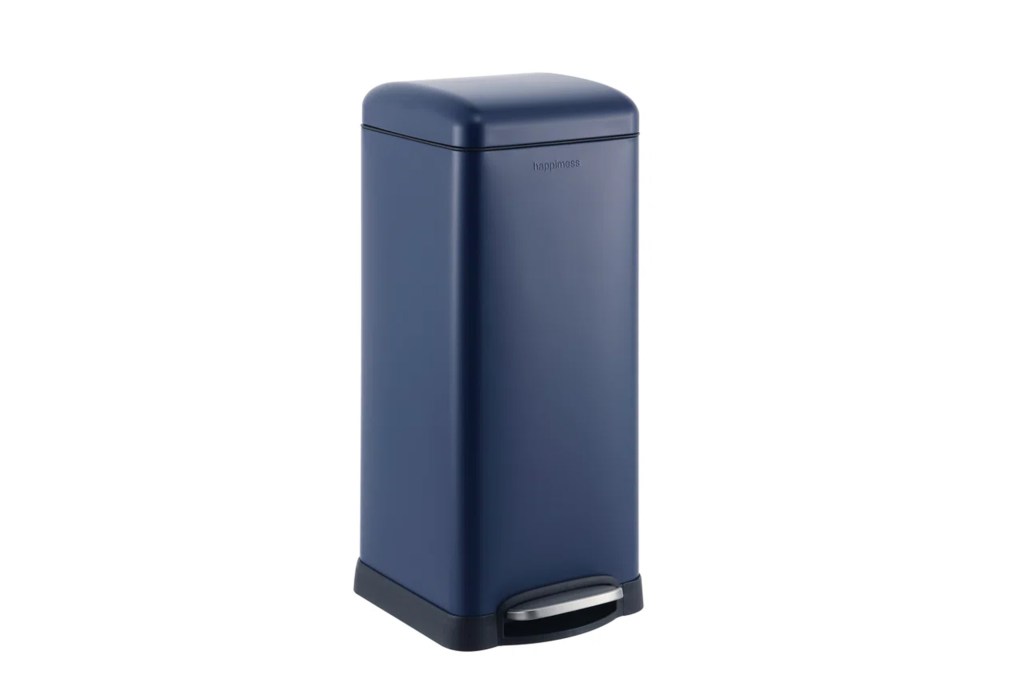 A blue trash can with a black lid