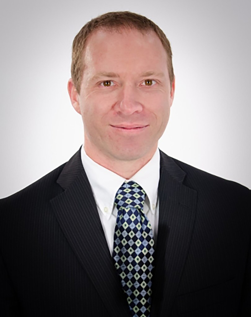 Tyler Wenzlaff of the Wisconsin Farm Bureau in an office setting