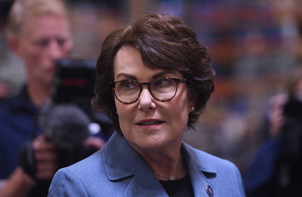 U.S. Senator Jacky Rosen, a woman wearing glasses and a blue jacket, visiting Dragonfly Energy in Reno on July 2, 2024.