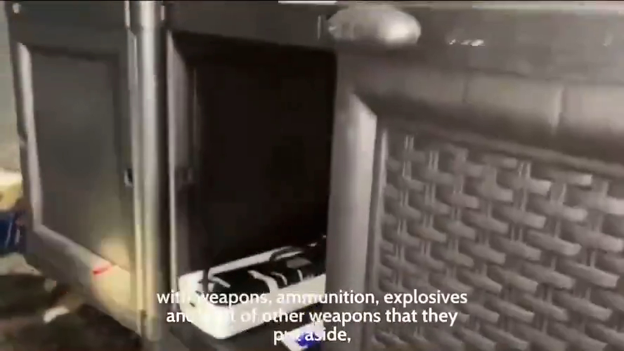 A locker next to the terrorists' beds held their weapons, ammo, and explosives.