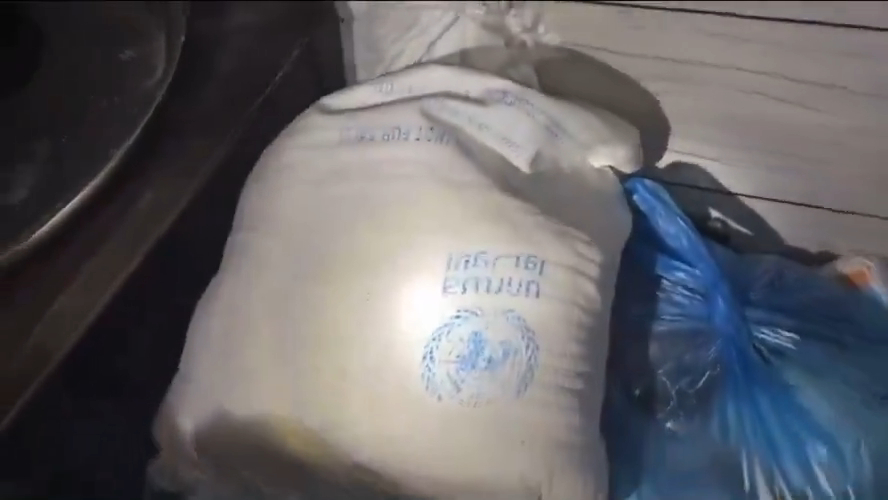 The bunkers kitchen has a bag of food from the UNRWA, which Hamas has long-been accused of stealing supplies from.