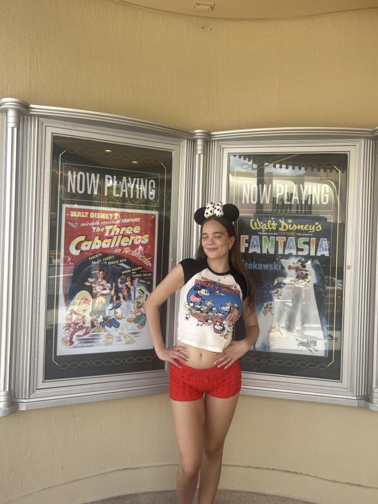 Jessie Lee, 21, in shorts and a crop top at Disney. 