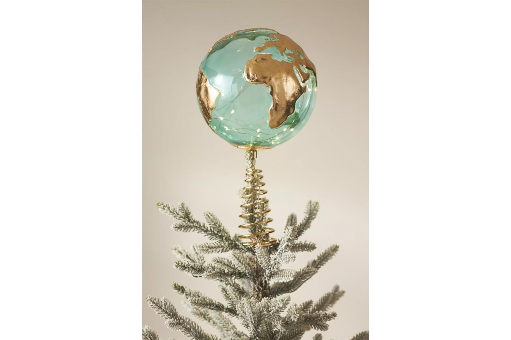 A globe situated on top of a tree