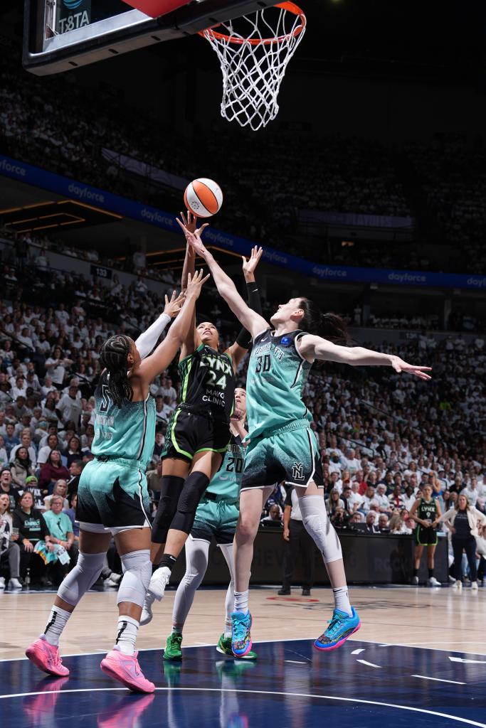 Napheesa Collier #24 of the Minnesota Lynx drives to the basket during the game against the New York Liberty during Game 3 of the 2024 WNBA Finals on October 16, 2024 at Target Center in Minneapolis, Minnesota.