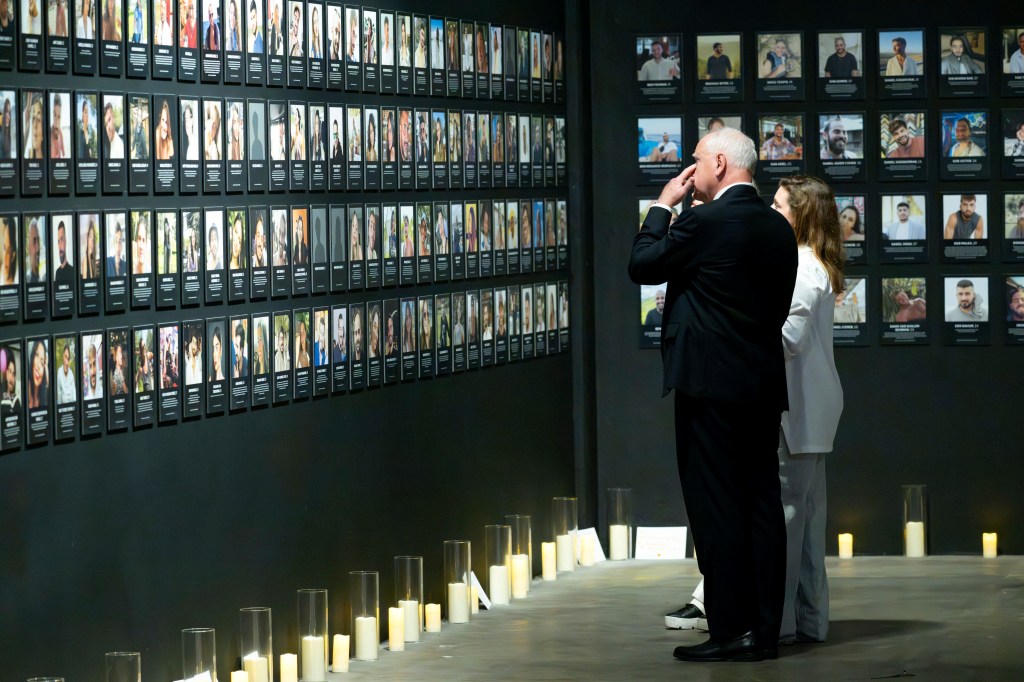 Vice Presidential candidate, Minnesota Gov. Tim Walz, visits the Nova Music Festival Exhibition on the first anniversary of the Oct. 7 Hamas attack on Israel, in Culver City, Calif., Monday, Oct. 7, 2024. 