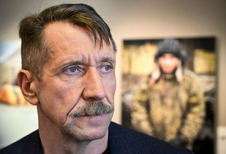 Viktor Bout, member of the Liberal Democratic Party of Russia, posing at an art exhibition opening in Moscow