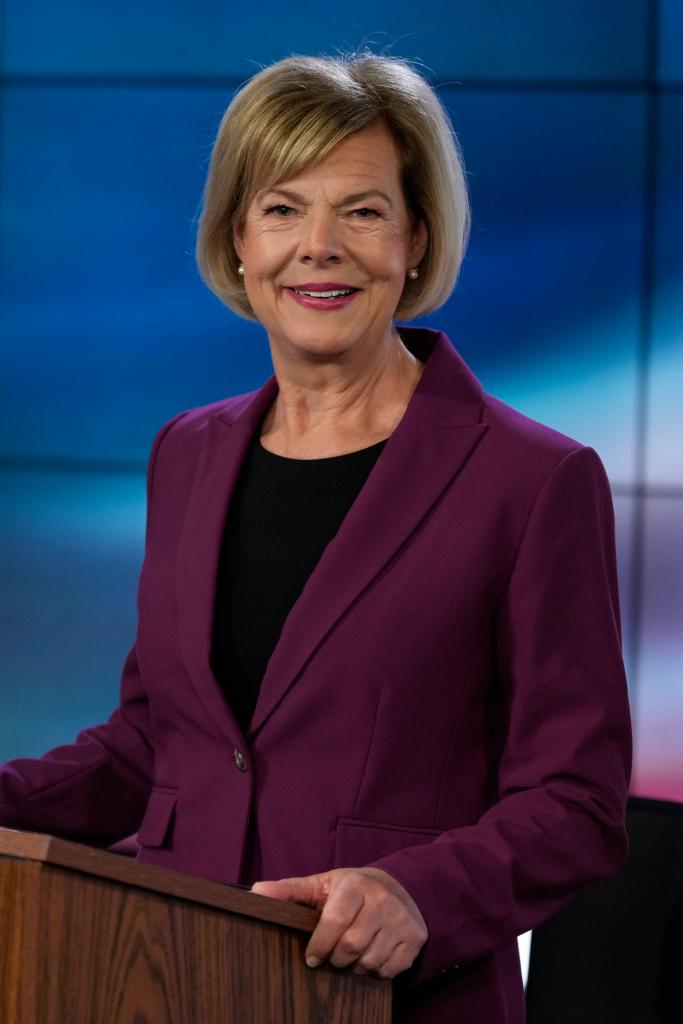 U.S. Senator Tammy Baldwin in a purple suit before a televised debate in Madison, Wisconsin, in 2024