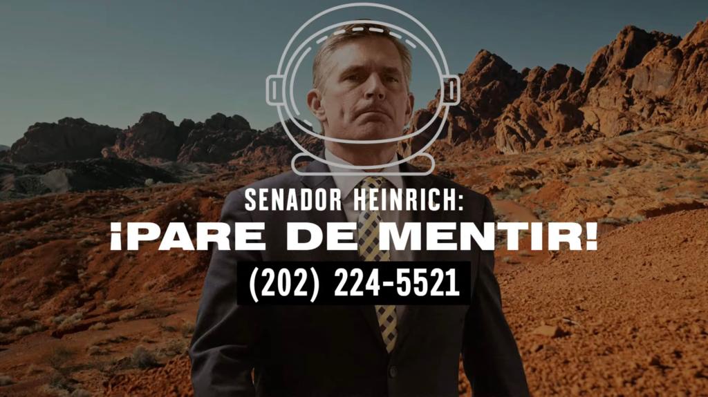 Sen. Martin Heinrch, standing in front of red rocks, with the words "PARE DE MENTIR" in front of him