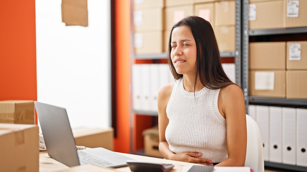 A woman hungry at work.