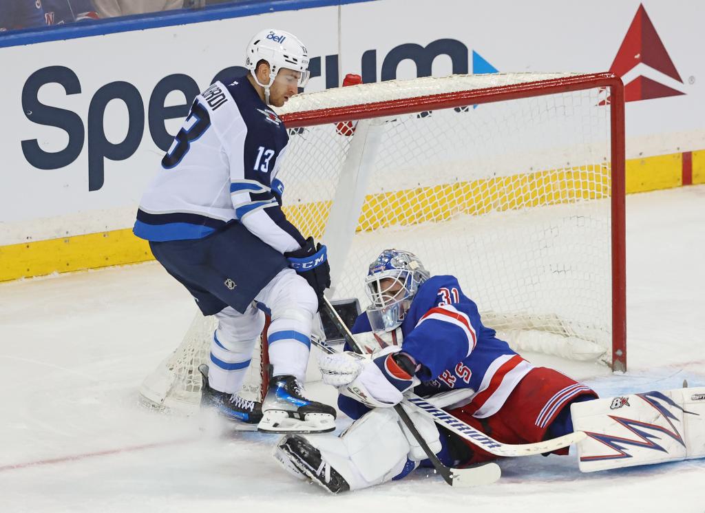 Igor Shesterkin #31 of the New York Rangers makes a save on a shot by Gabriel Vilardi #13 of the Winnipeg Jets during the third period. 