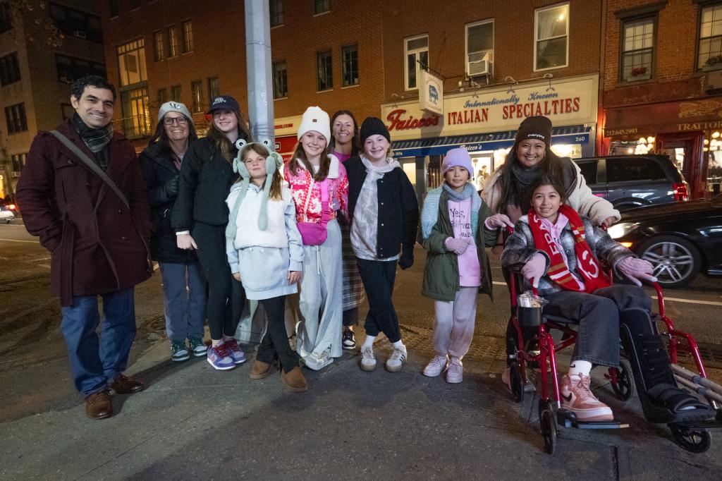 The entire tour group on the corner of Cornelia Street.