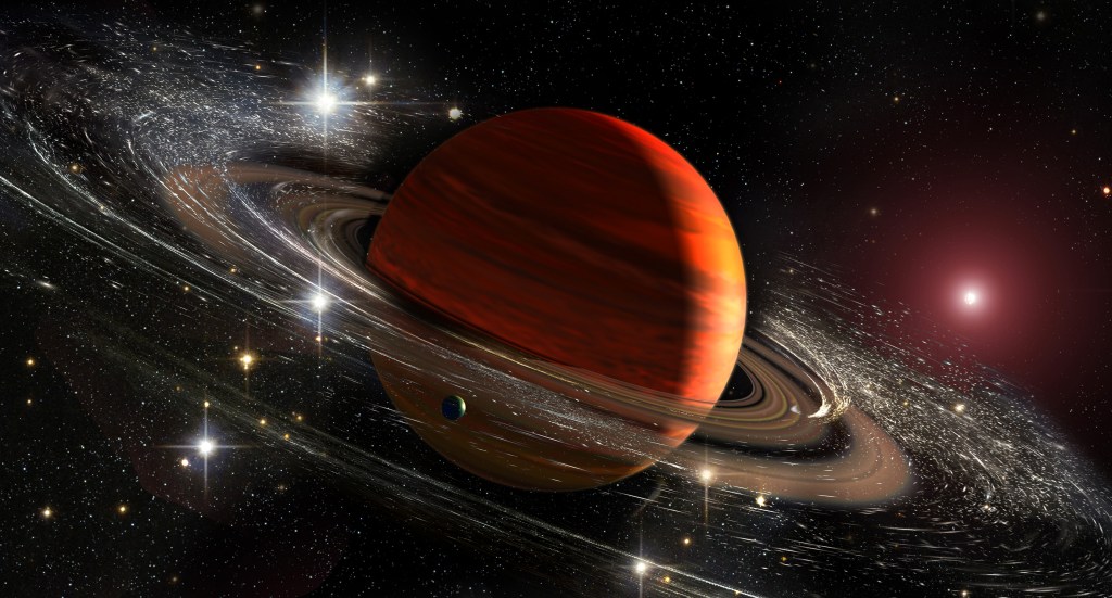 Saturn planet with its distinctive rings, floating in outer space among stars and stardust