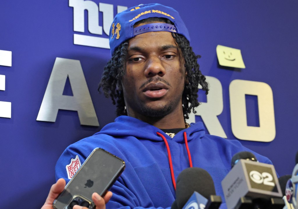 Malik Nabers talks to the media on Nov. 26, 2024.