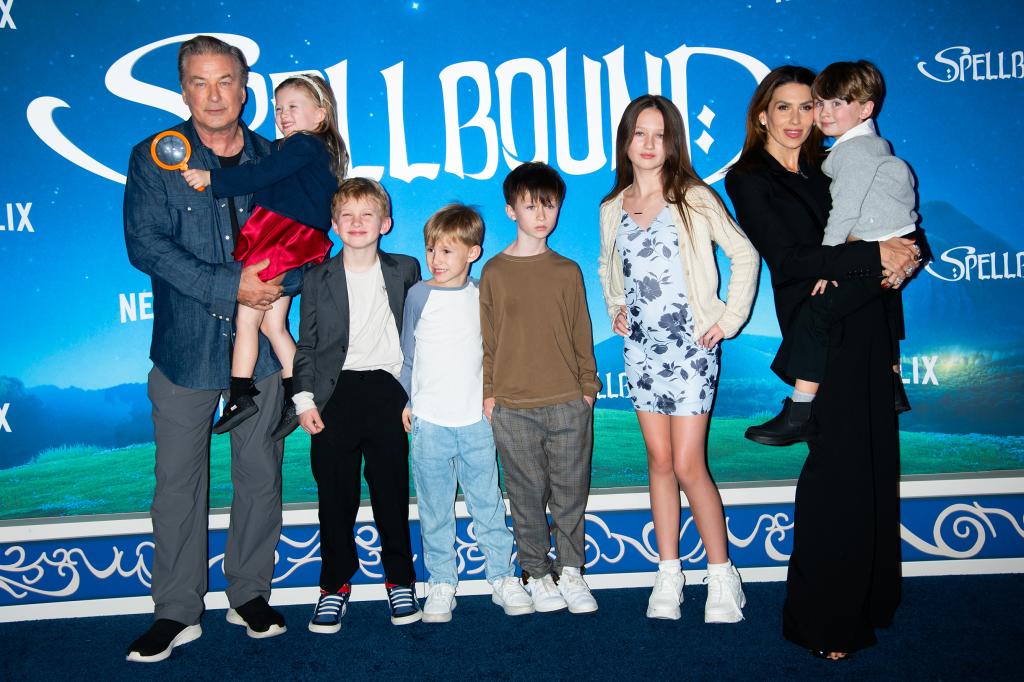 Alec and Hilaria Baldwin posing with six of their kids.