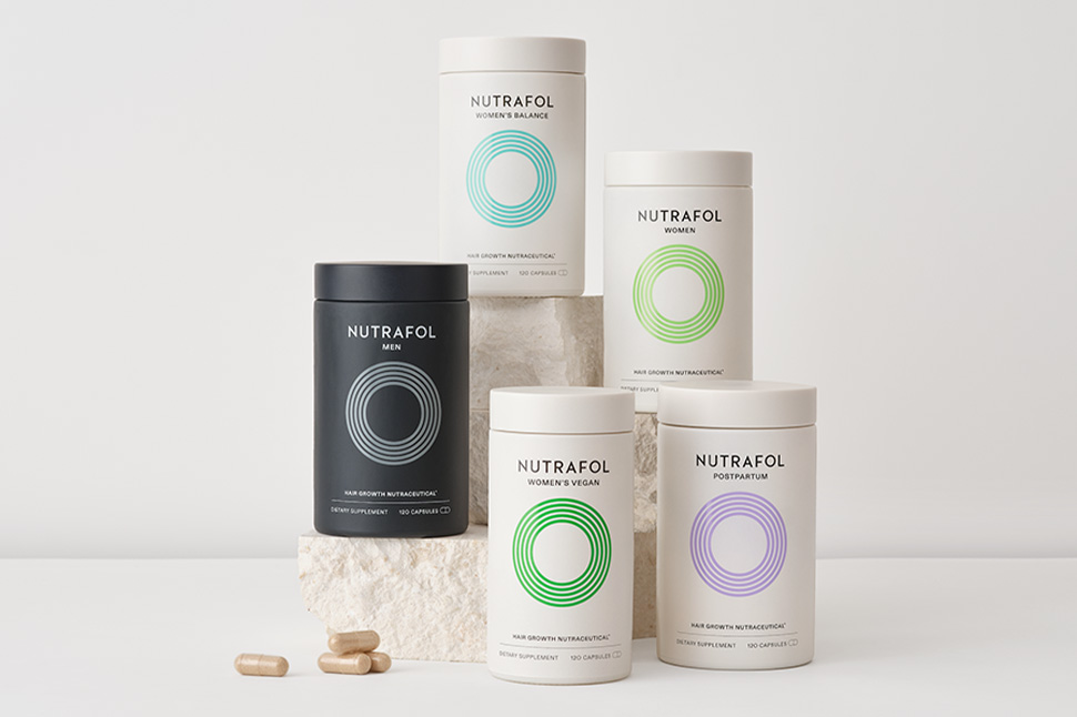 A group of white containers with black and green circles on them