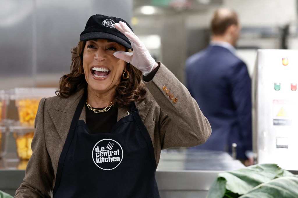 U.S. Vice President Kamala Harris celebrates Thanksgiving Day by helping to prepare vegetables at DC Central Kitchen (DCCK) in Washington, U.S., November 28, 2024.