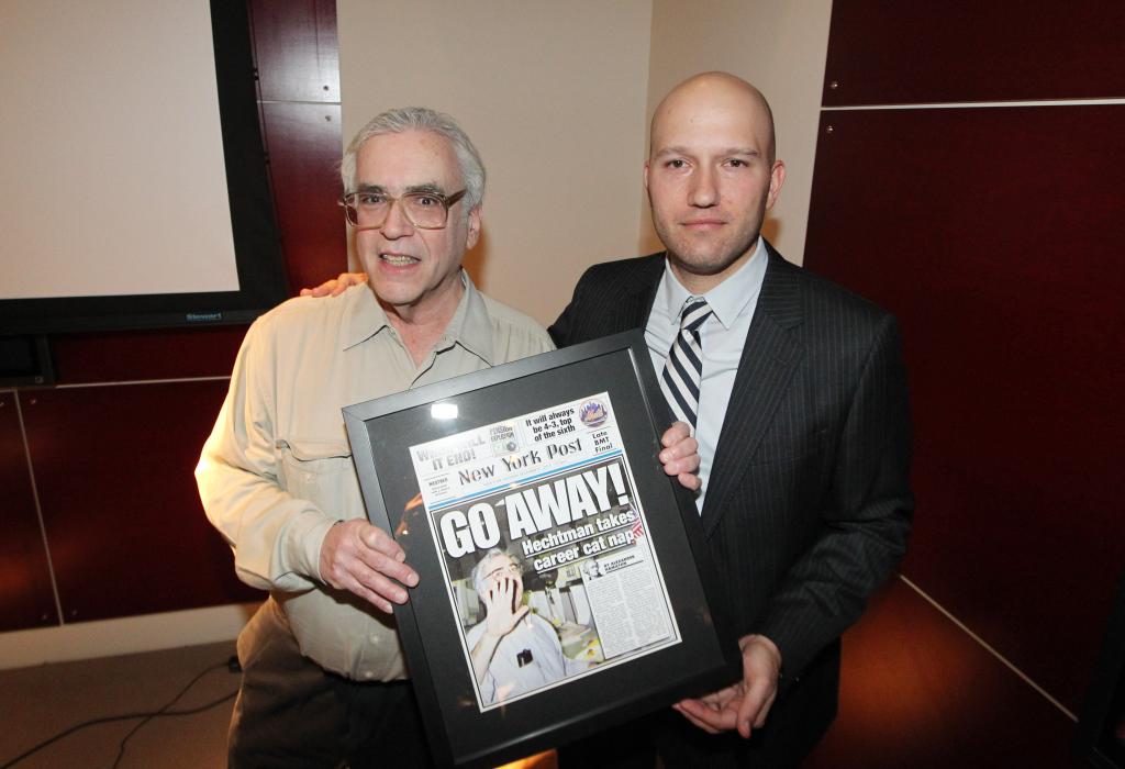 Mike Hechtman at his retirement party holding a picture, with Eric Lenkowitz and David Backes in the News Corp building.