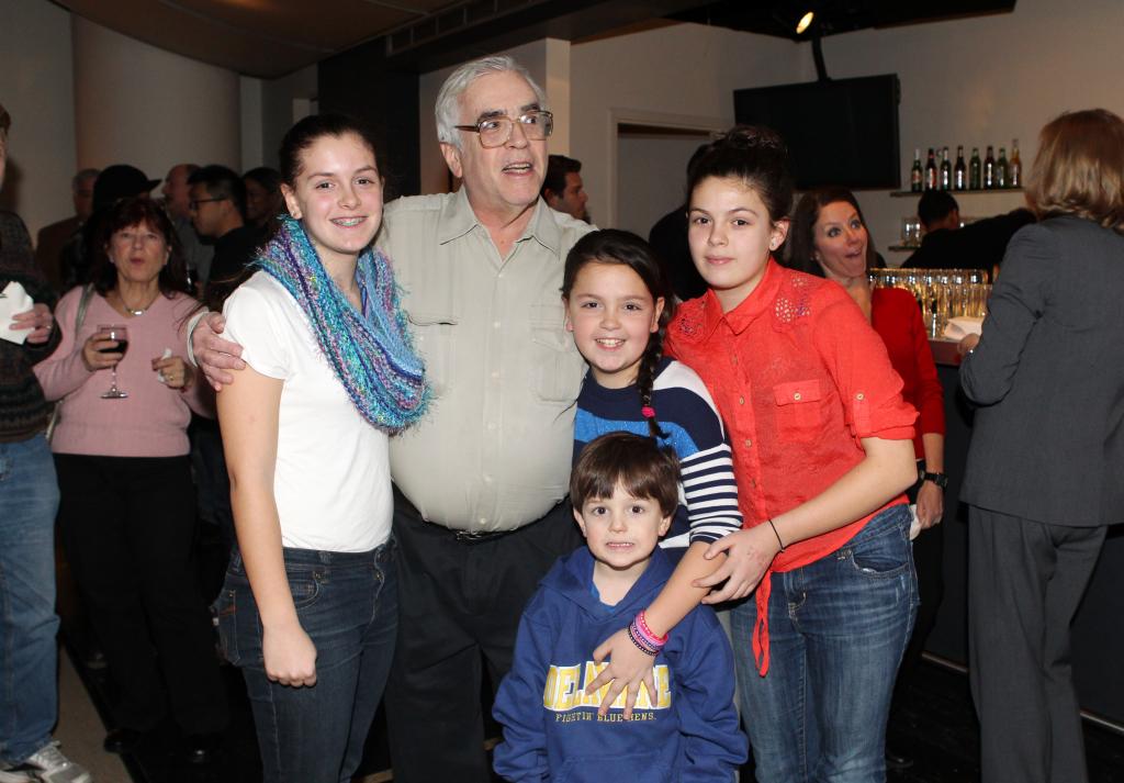 Group photo at Mike Hechtman's retirement party at the News Corp building, including Hasan Ali Toptaş, Trent Kowalik, Cassandra Magrath, Penelope Corrin, and Cynthia Kenyon