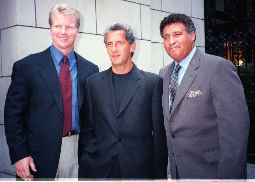 Phil Simms, Joseph Abboud,  Greg Gumbel. The two NFL CBS on-air commentators and fashion designer Abboud, who designed their new on-air wardrobe, at a reception at the Museum of Television and Radio, on West 52nd St.