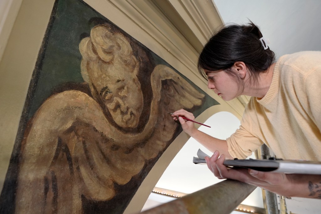 Conservator Corrine Long restoring nearly 300-year-old painted angels on the walls of Old North Church, Boston