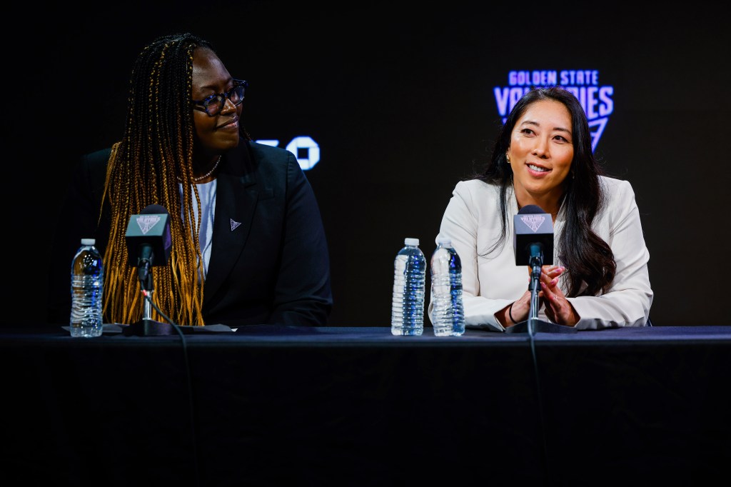 Golden State Valkyries General Manager Ohemaa Nyanin, left, announces their new head coach Natalie Nakase.