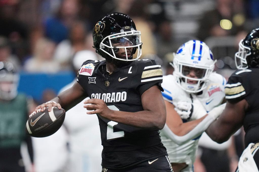 Colorado quarterback Shedeur Sanders (2) looks to throw during the Alamo Bowl against BYU on Dec. 28, 2024.