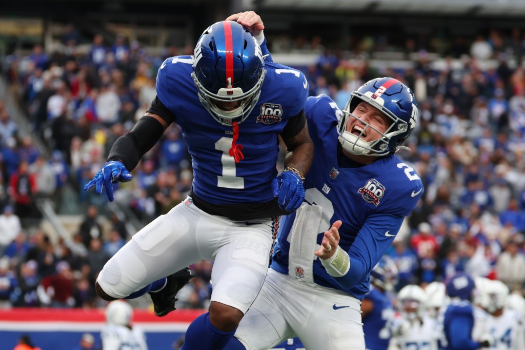 Giants wideout Malik Nabers (1) celebrates with quarterback Drew Lock (2) during the Giants' win over the Colts.