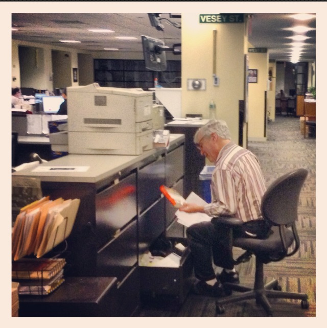 NY Post Editor Mike Hechtman cleaning out his cabinet drawer in the newsroom, preparing for his retirement in 2021