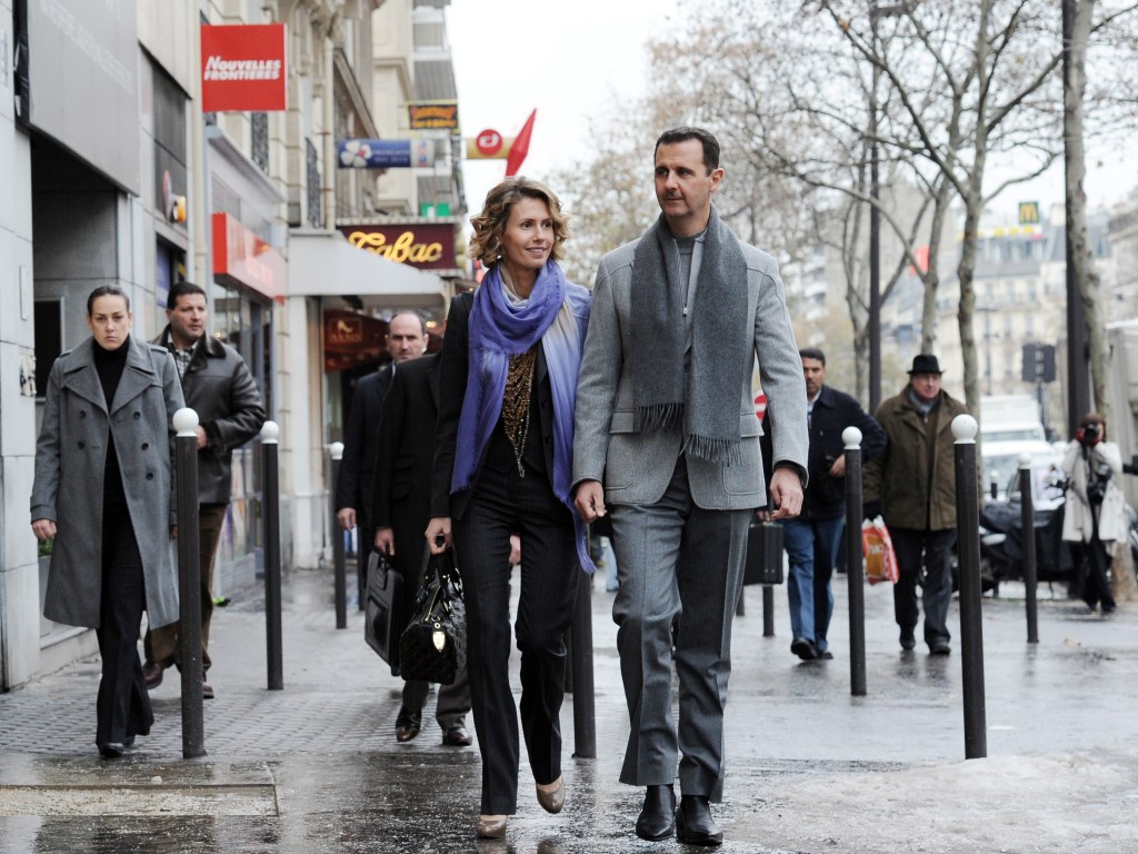 Bashar al-Assad and Asma al-Assad.