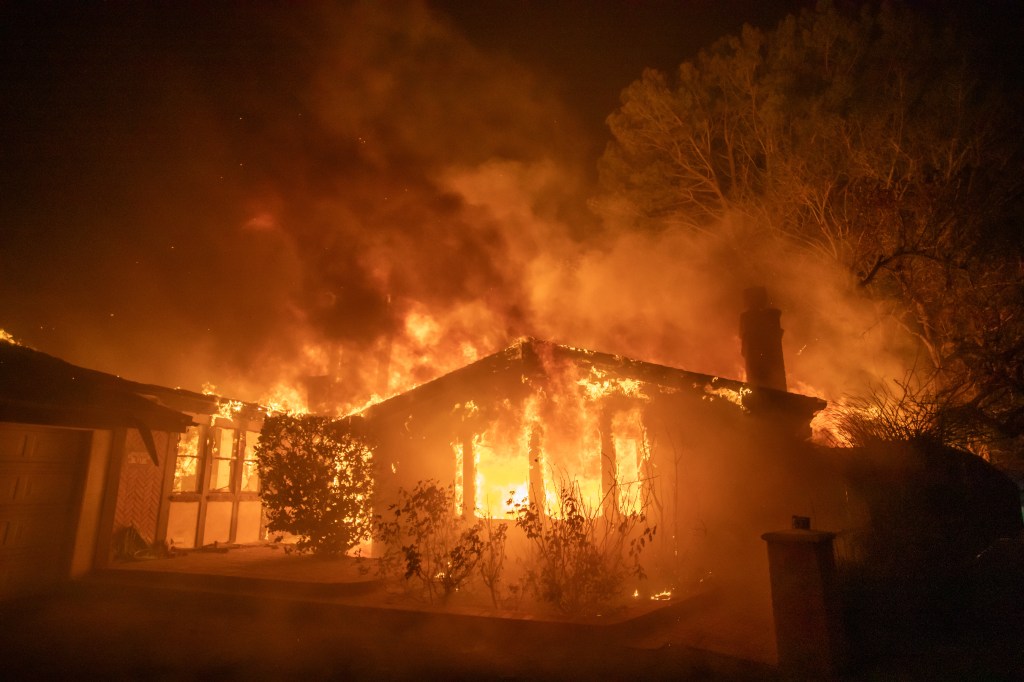 A house on fire in Pacific Palisades