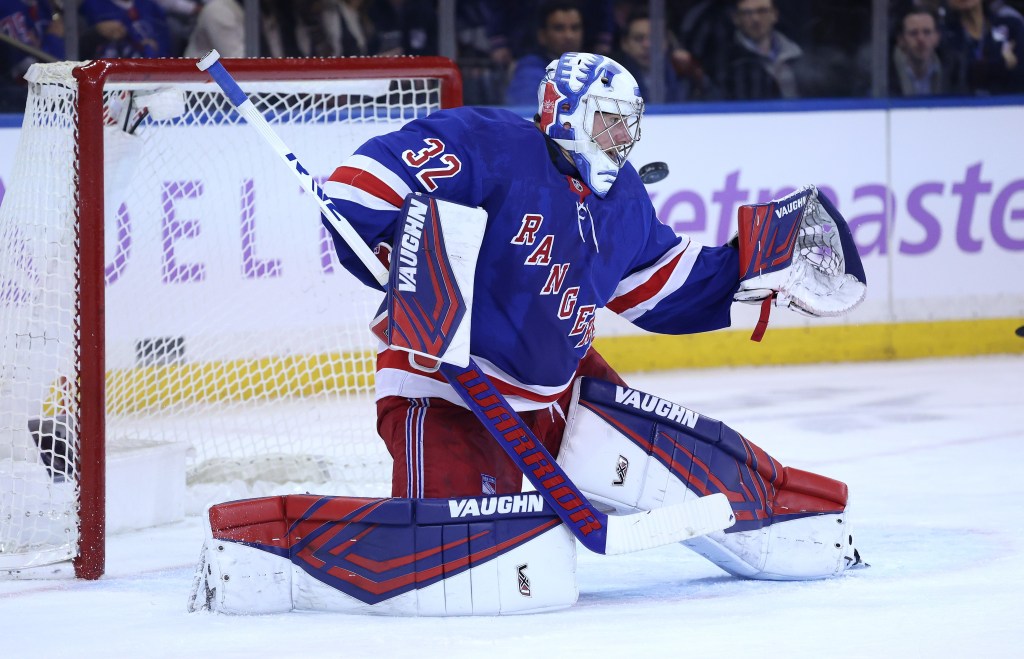 Jonathan Quick makes a save during the Rangers' OT loss.