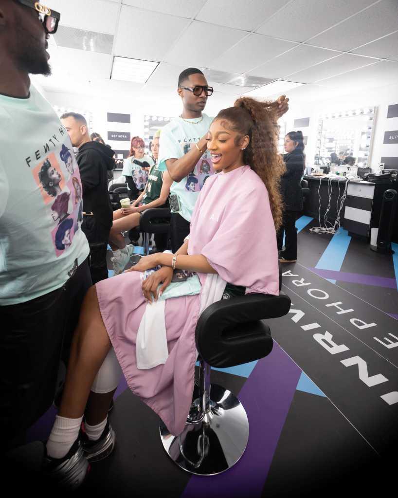 Angel Reese tests out the Unrivaled glam room.