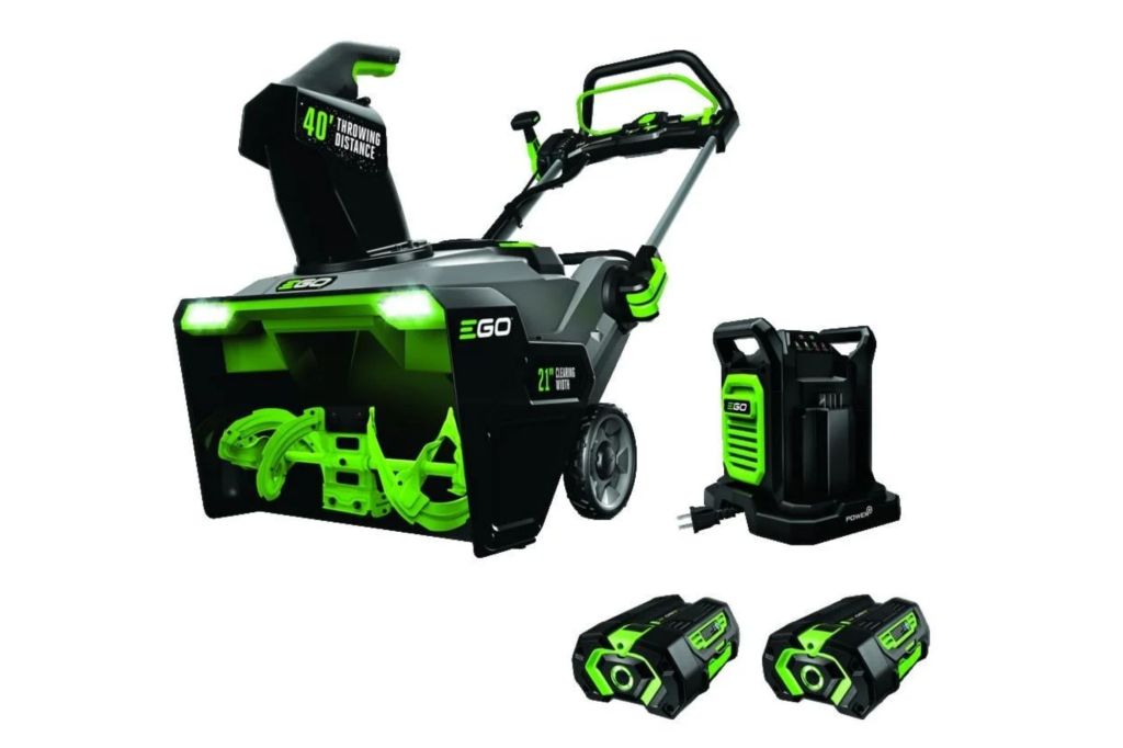 A green and black snow blower, considered as one of the best in the market