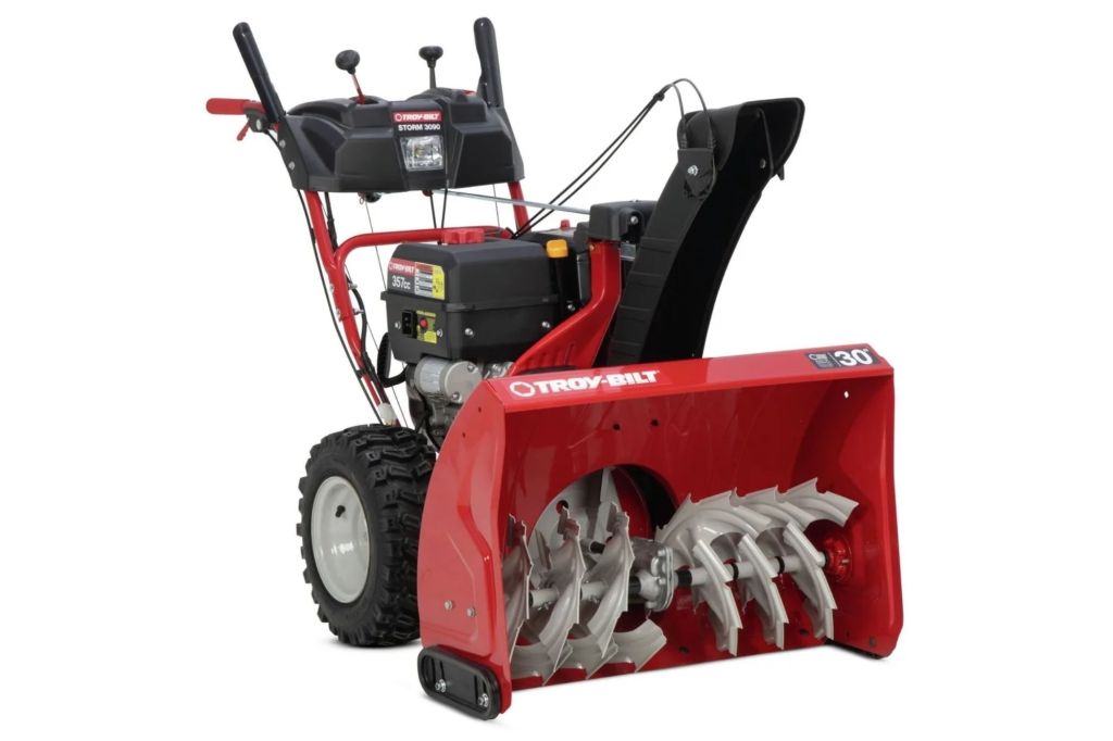 A large, red snow blower.
