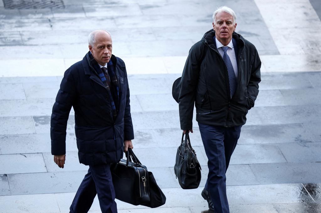 Knox's lawyers Luca Luparia Donati and Carlos Dalla Vedova leaving court in Rome on Jan. 23, 2025.