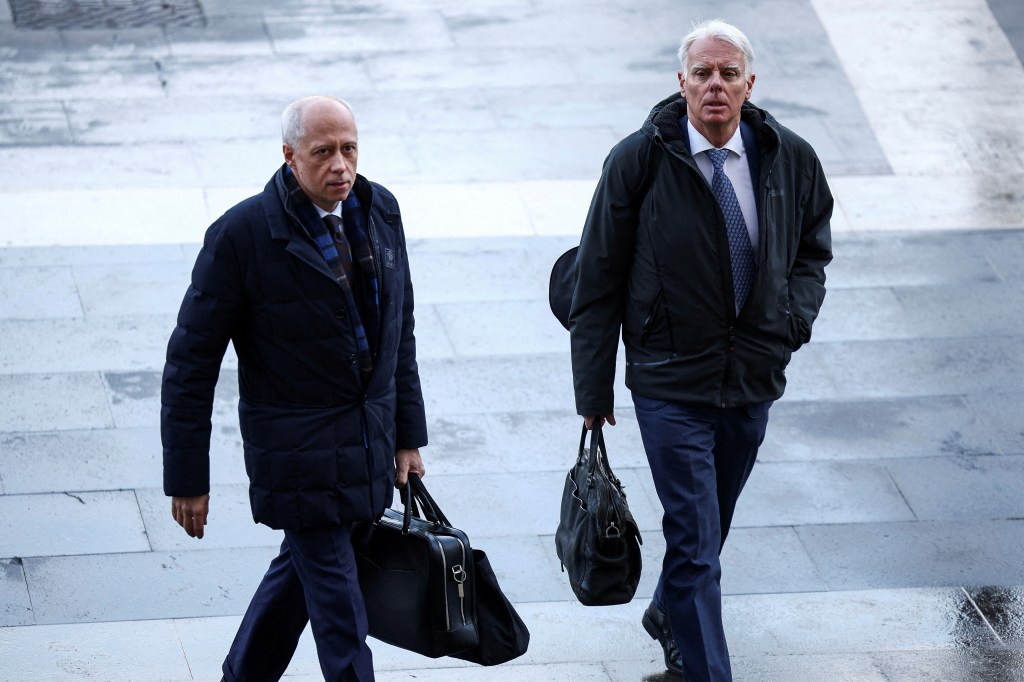 Knox's lawyers Luca Luparia Donati and Carlos Dalla Vedova leaving court in Rome on Jan. 23, 2025.